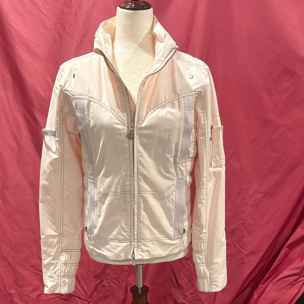 equestrian style jacket 
ruched side panels